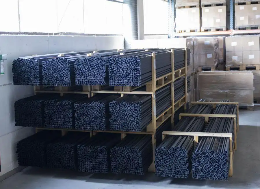a warehouse with stacks of metal