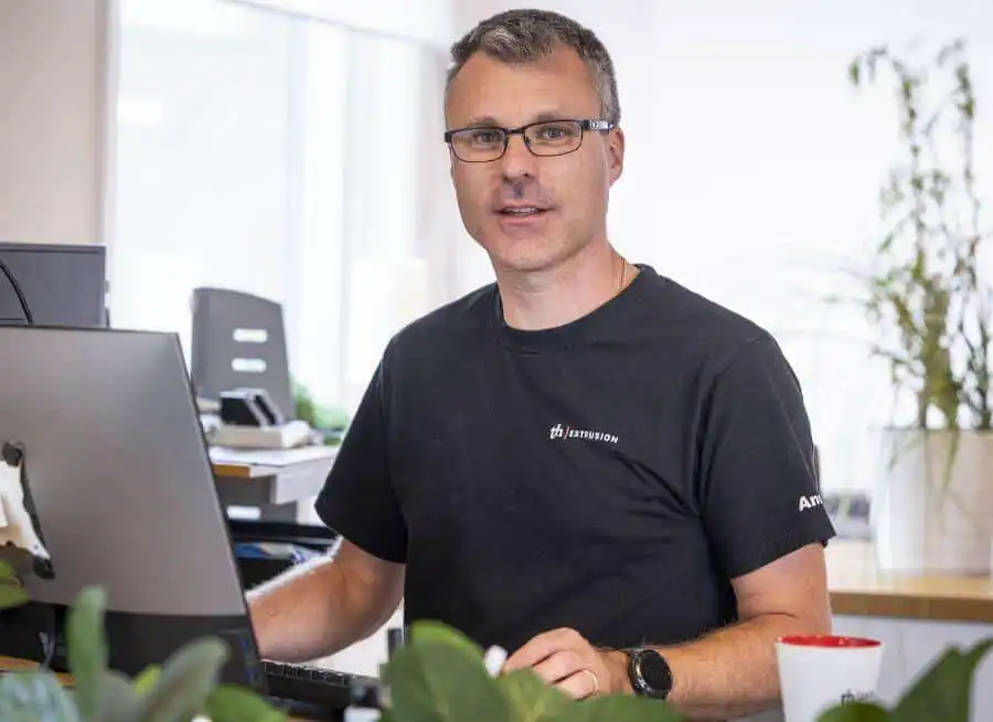 a man sitting at a computer